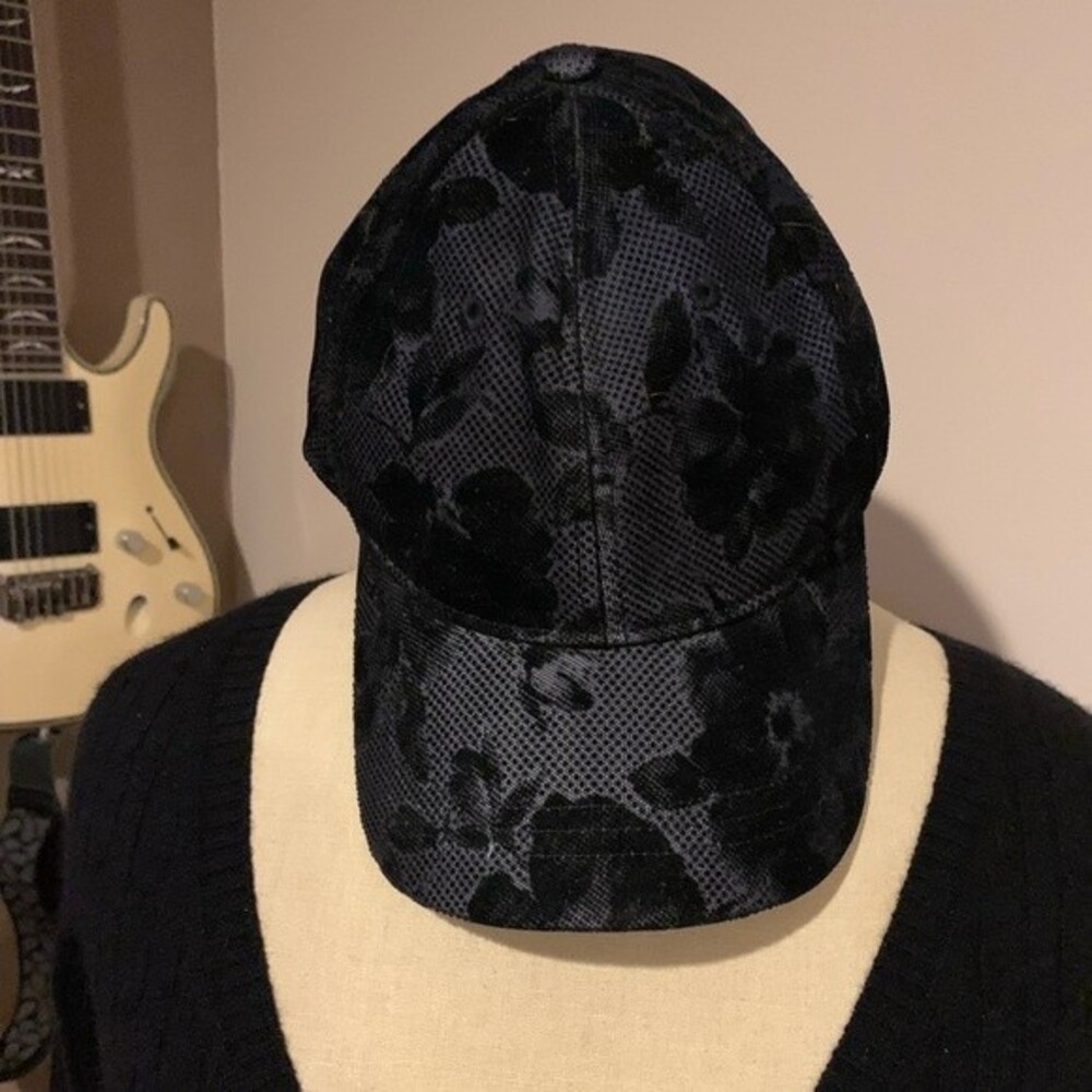 Lululemon ball cap. Black with floral design. Feels like velvet. Adjustable band